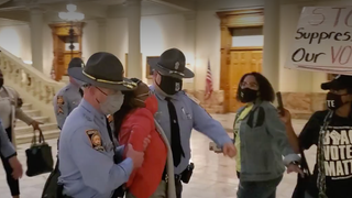 A Black Lawmaker Was Arrested, Charged With 'Knowingly' Knocking on Brian Kemp's Door As He Disenfranchised Black Voters